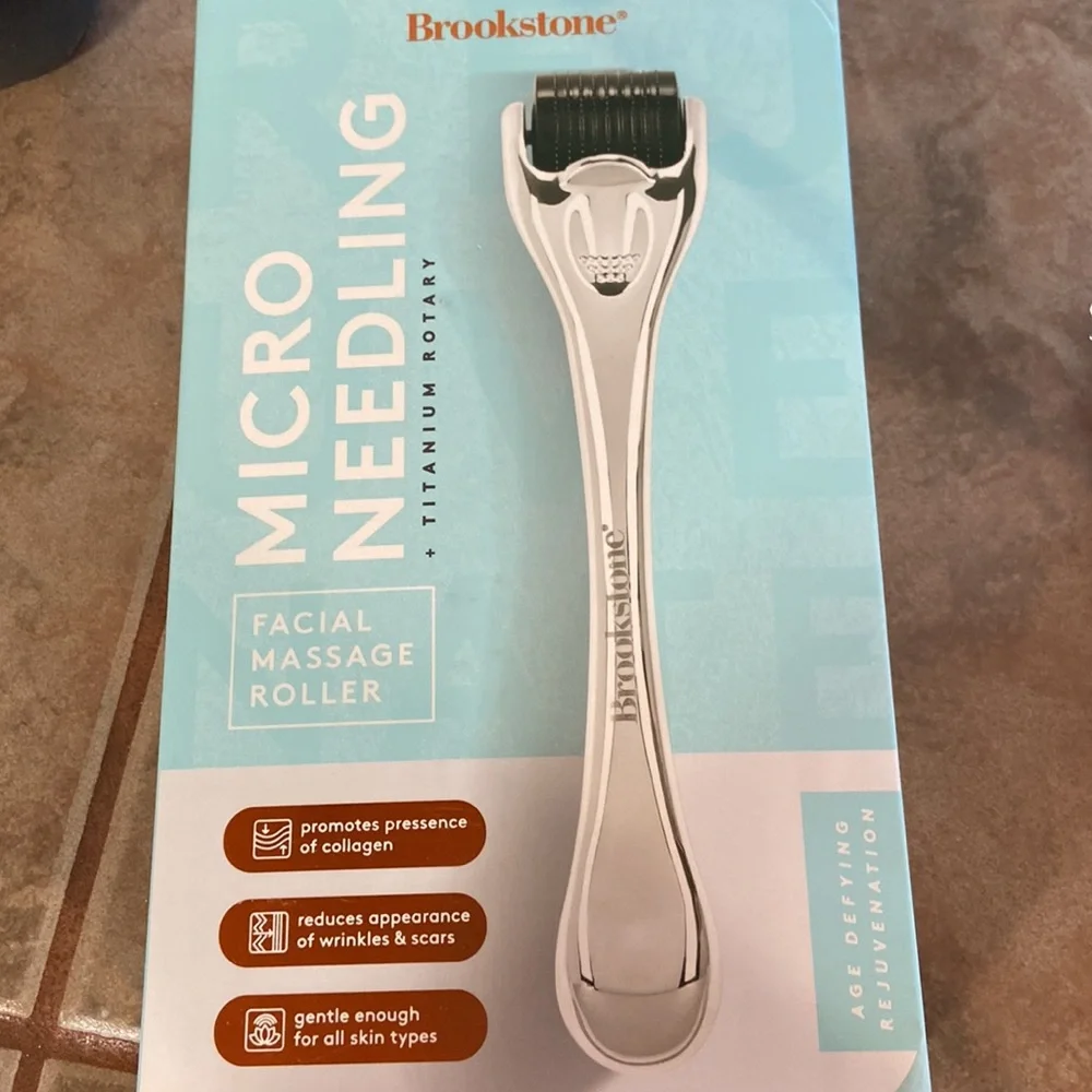 Brookstone Micro Needling Facial Massage Roller in White and Black